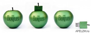 USB флэшка в форме зеленого яблока с альбомами The Beatles