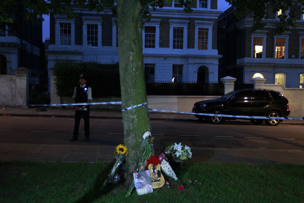 Дом Эми Уайнхаус вечером 23 июля